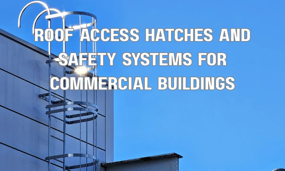 Commercial building roof access hatch with safety railing and ladder system installed for safe rooftop entry