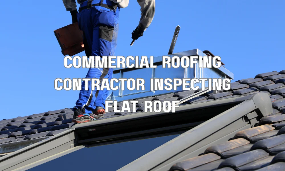 Commercial roofing contractor inspecting a flat commercial roof and discussing installation and safety requirements