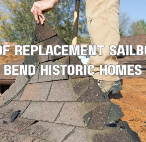 Roof replacement on a historic Sailboat Bend style home with workers installing new shingles