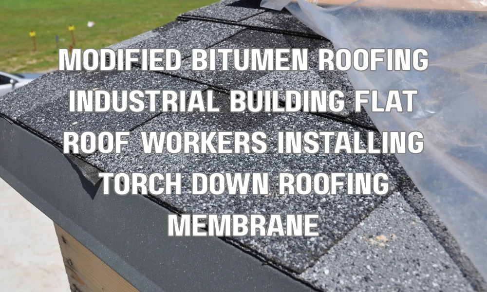 Workers installing modified bitumen roofing system on an industrial flat roof in South Florida