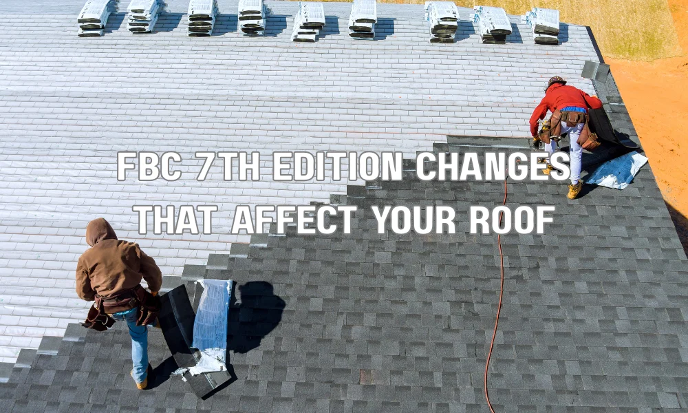 Roof inspector examining asphalt shingles to ensure compliance with FBC 7th Edition roofing code changes