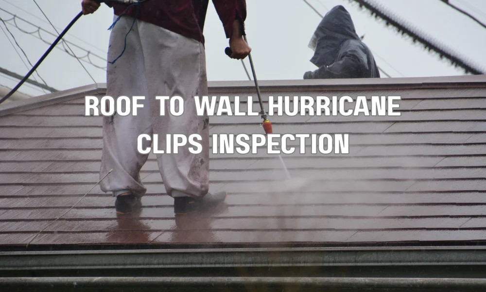 Building inspector checking hurricane clips at roof truss to wall plate connection for Florida wind code compliance