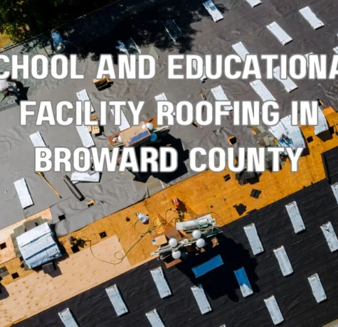 Roofing contractors performing maintenance on a school building in Broward County