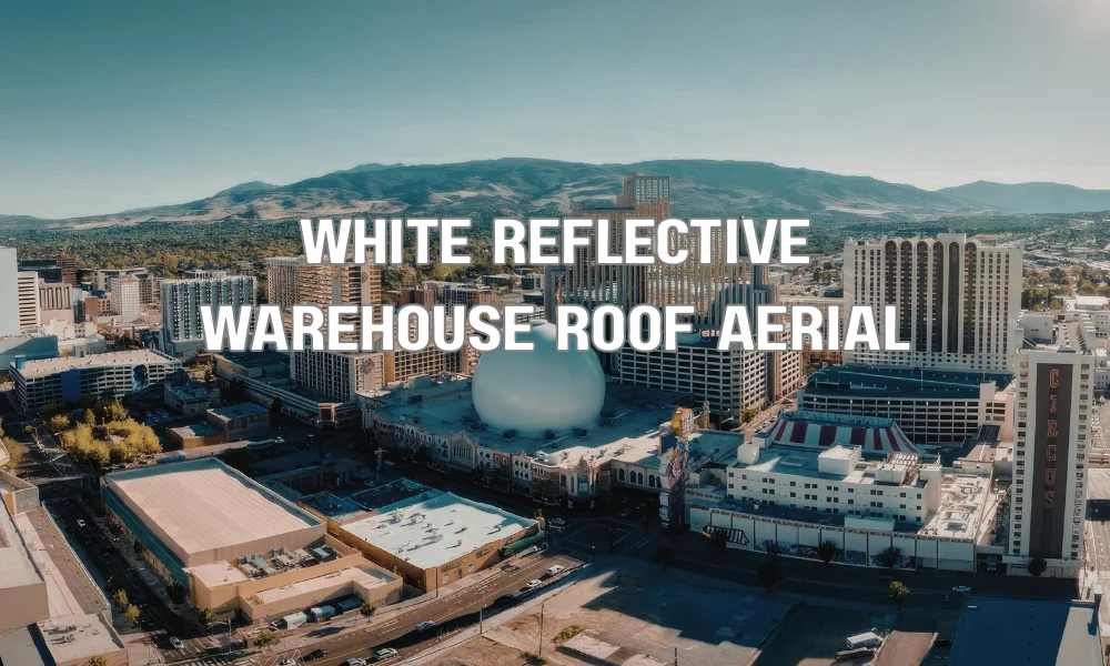 White reflective cool roof on a commercial warehouse in Fort Lauderdale designed to resist heat, UV exposure, and humidity.