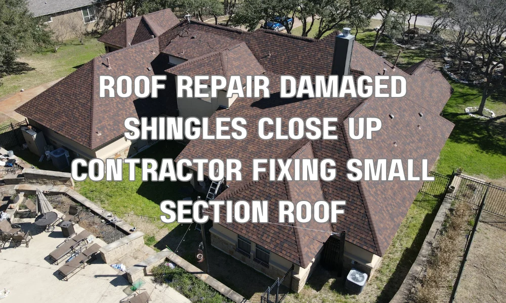 Contractor repairing a small section of damaged roof shingles on a residential home