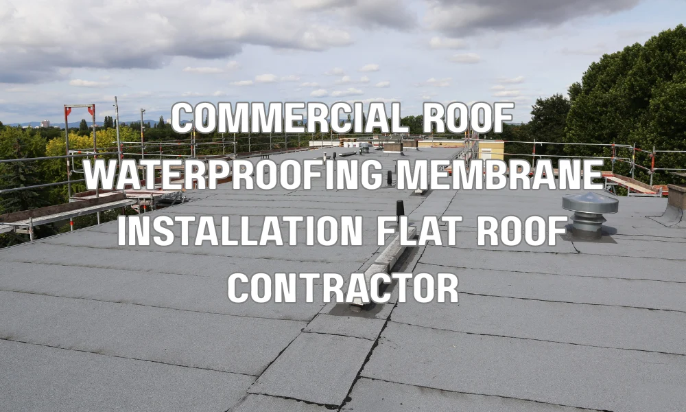 Contractors installing a commercial waterproofing membrane on a flat roof in a high-wind coastal environment