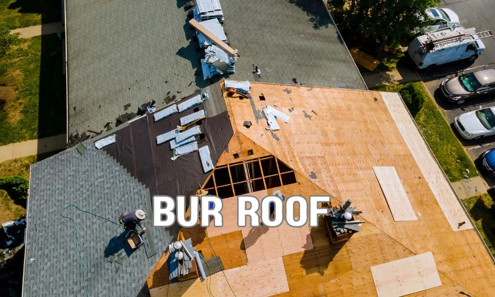 Built-Up Roofing (BUR) system with multiple layers of asphalt and reinforcing felt being installed on a commercial flat roof, finished with protective gravel surfacing. Traditional commercial roofing construction highlighting durable waterproof membrane, long-lasting performance, and professional installation.