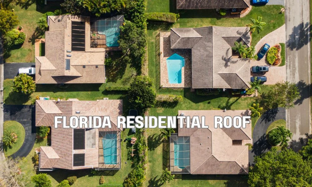 Florida residential asphalt shingle roof in excellent condition on a modern home, highlighting roof age, durability, and insurance eligibility under clear daylight.