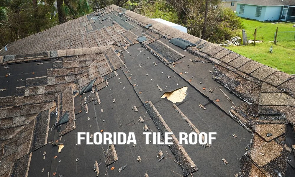A Florida multifamily residential building with a durable tile roof under construction, showing roofing underlayment installation, roof tiles, and workers following modern building code standards in a sunny suburban setting.