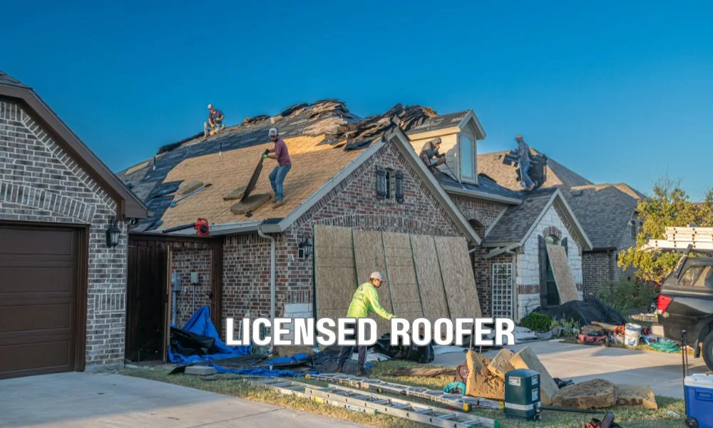 Licensed Florida roofing contractor reviewing roofing license credentials and contractor documents with a homeowner before signing a residential roofing contract.