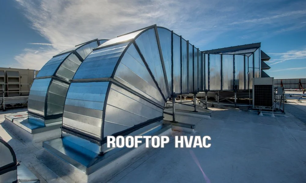 Modern energy-efficient commercial roof with reflective roofing materials and rooftop HVAC system, demonstrating sustainable building design and improved thermal performance.
