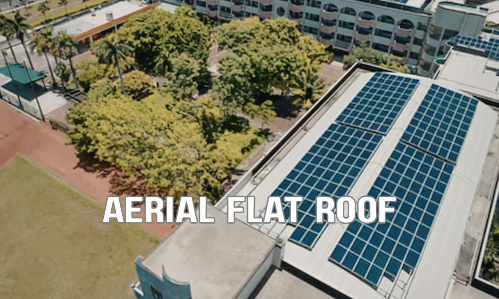 Ballasted commercial roofing system with stone ballast on a flat roof designed for low-rise buildings, illustrating limitations in Florida's high-wind conditions.