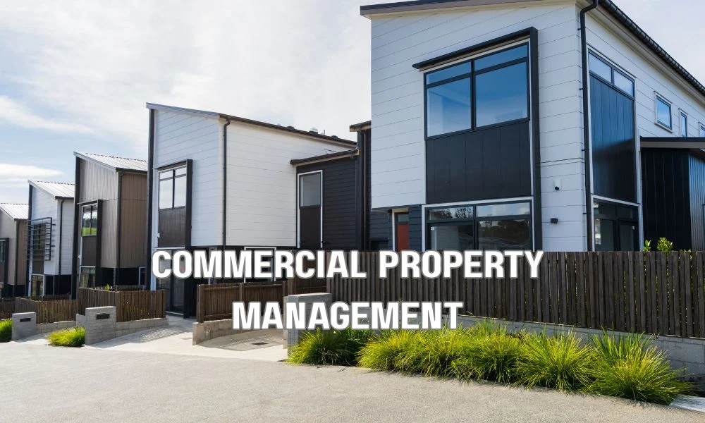 Commercial landlord and tenant reviewing a detailed lease agreement and property maintenance documents while discussing transparent CAM charges, roof maintenance planning, and building management in a modern office.