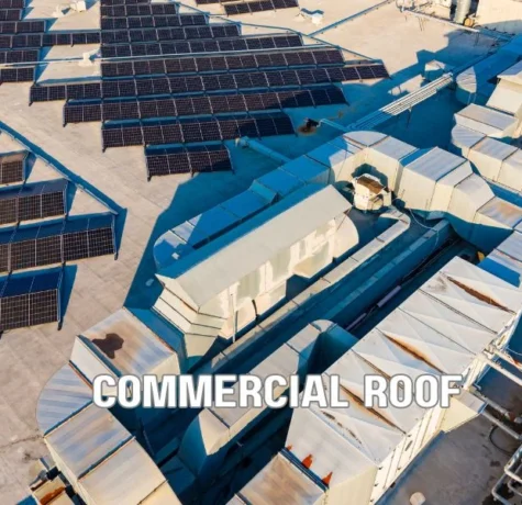 Technician inspecting a commercial roof assembly with testing equipment to evaluate wind uplift resistance and roofing system performance under TAS, UL, and FM certification standards.