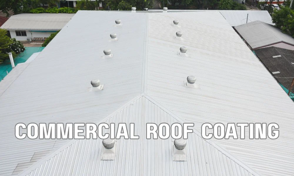 Close-up of a commercial roof with a silicone roof coating being applied, highlighting surface preparation and protective equipment. The image represents coating durability, higher installation costs, and maintenance considerations for commercial roofing systems.