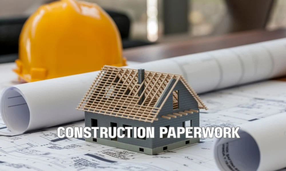 Commercial roofing contractor reviewing Florida re-roofing project documents, permits, inspection reports, and completion paperwork to ensure code compliance and quality assurance.