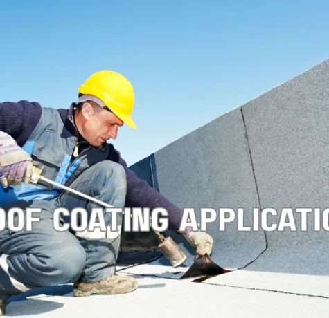Technician performing preventive maintenance and restoration on a flat commercial roof with sealant application, roof inspection tools, and modern office buildings in the background under a clear blue sky.