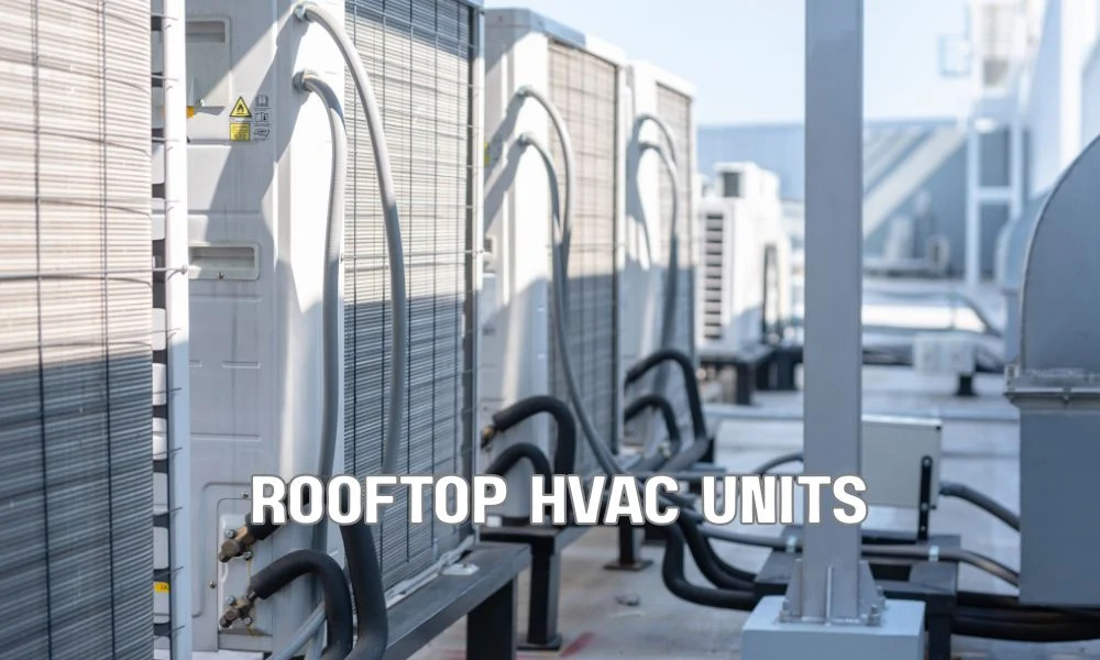 Commercial roofing contractor inspecting a large flat roof with HVAC units while reviewing maintenance conditions. Professional roof inspection highlighting factors such as roof size, age, materials, accessibility, and weather exposure affecting maintenance costs.