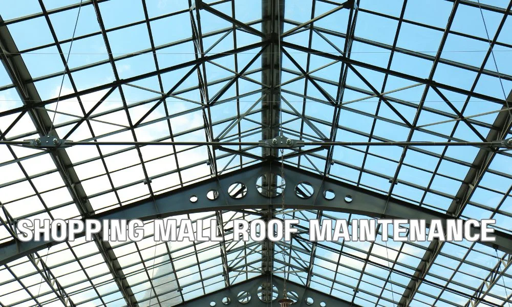 Commercial retail shopping center with a flat roof undergoing maintenance, showcasing multi-tenant storefronts, rooftop HVAC systems, and professional roofing inspection.