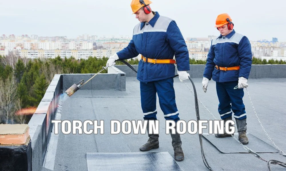 Close-up comparison of a modified bitumen roof and a built-up roofing (BUR) system on a commercial building, showing layered asphalt roofing materials, seams, and protective surfacing under daylight.