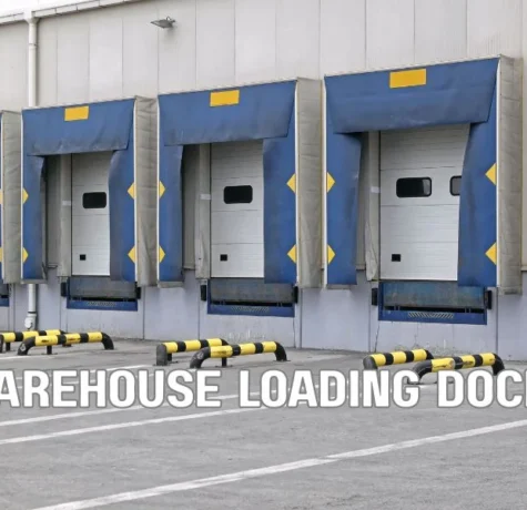 Modern Florida warehouse and distribution center with a large commercial flat roof during professional roofing replacement, showcasing durable roofing systems, safety equipment, and uninterrupted logistics operations.