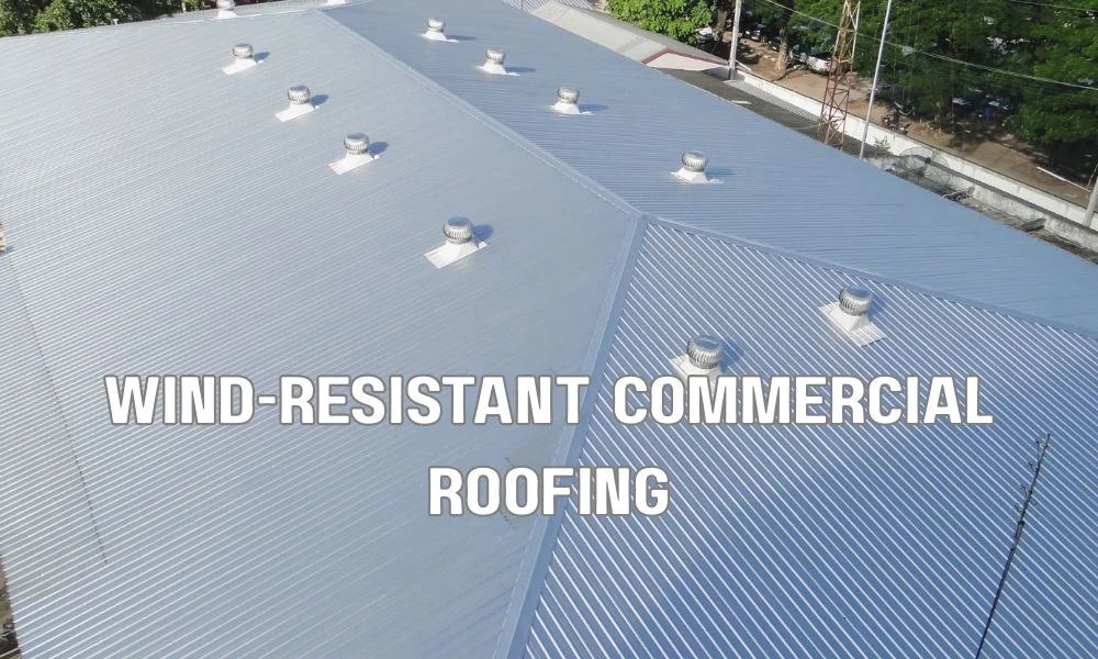 Wind-resistant commercial roofing systems including fully adhered single-ply, standing seam metal, and reinforced modified bitumen roofs