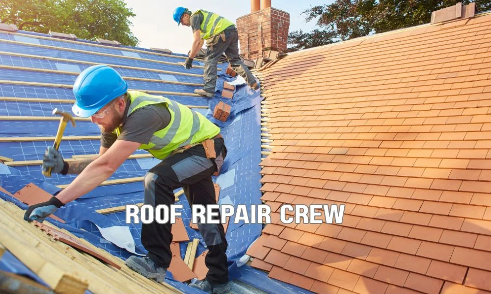 Commercial roofing professionals wearing safety gear inspecting hazardous roof damage while securing the area for emergency repairs to protect people and property.